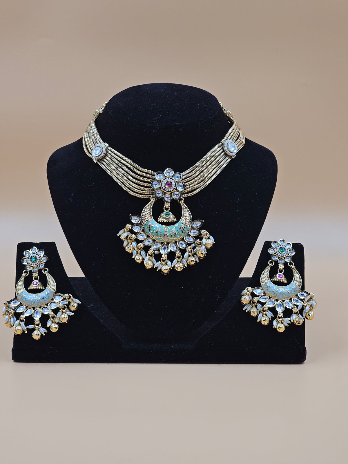 Gold-Finish Multistrand Necklace Set with Sky Blue Enamel & Crystal Stone Work