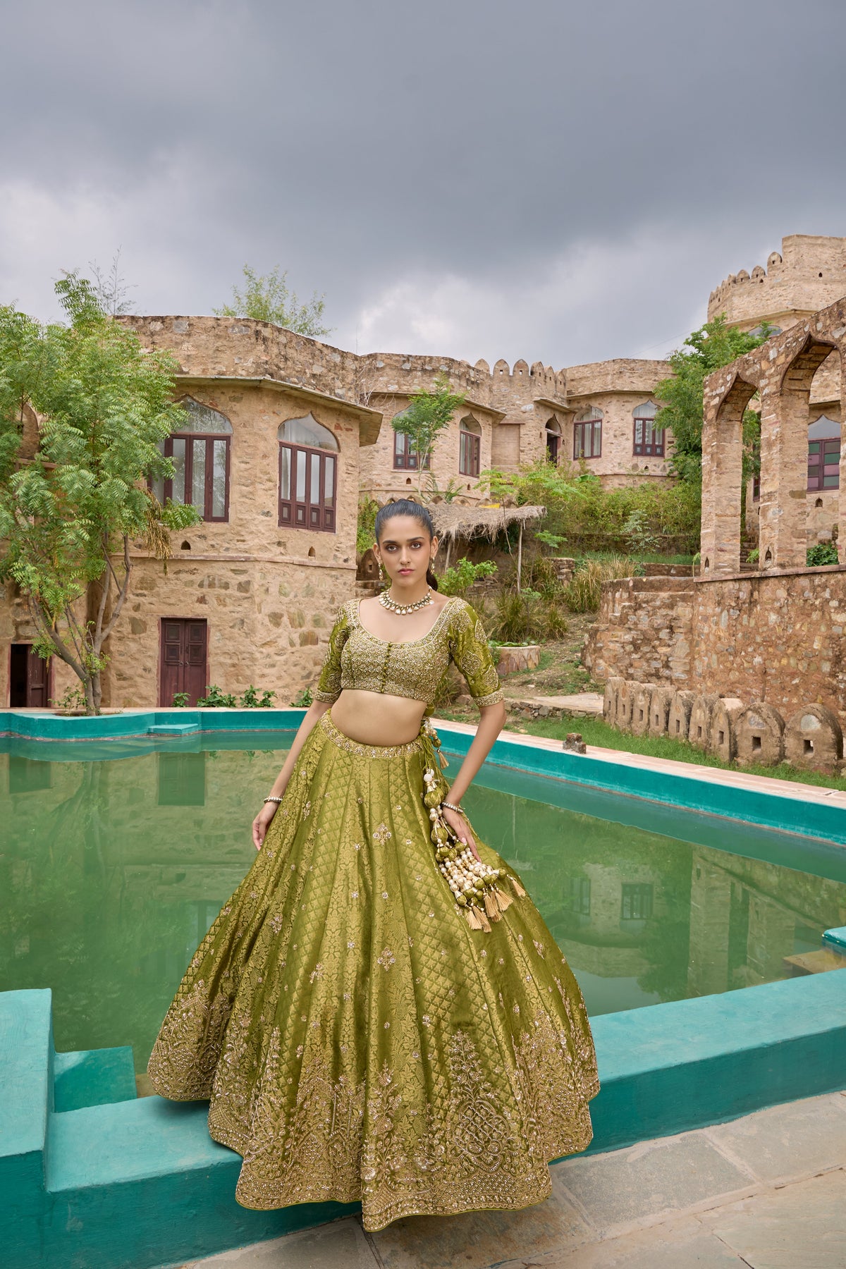 Mokshitha green brocade lehenga with dupatta