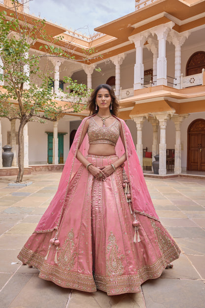 Prerna lehenga with sheer pink dupatta worn as a cape