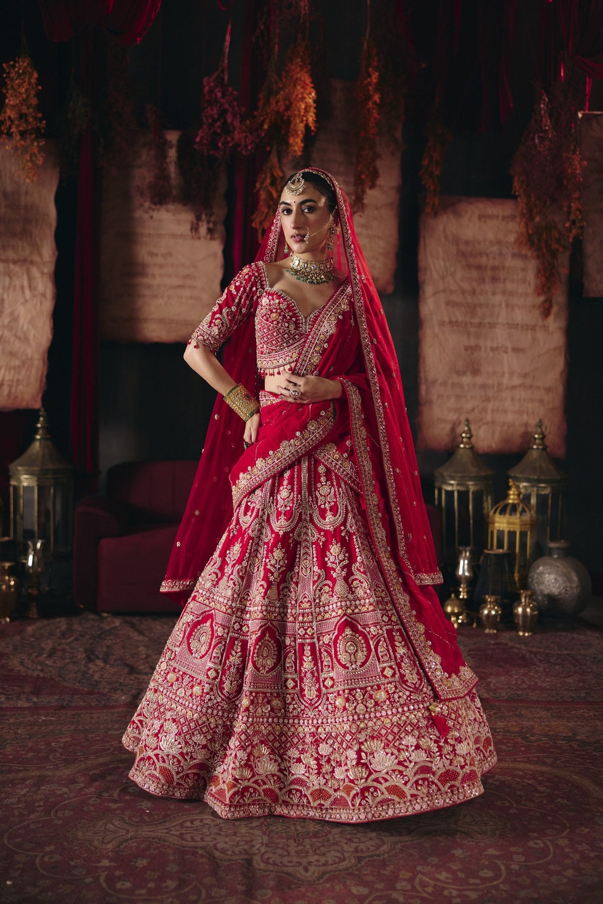 Crimson red heavy embroidered bridal lehenga set, full length