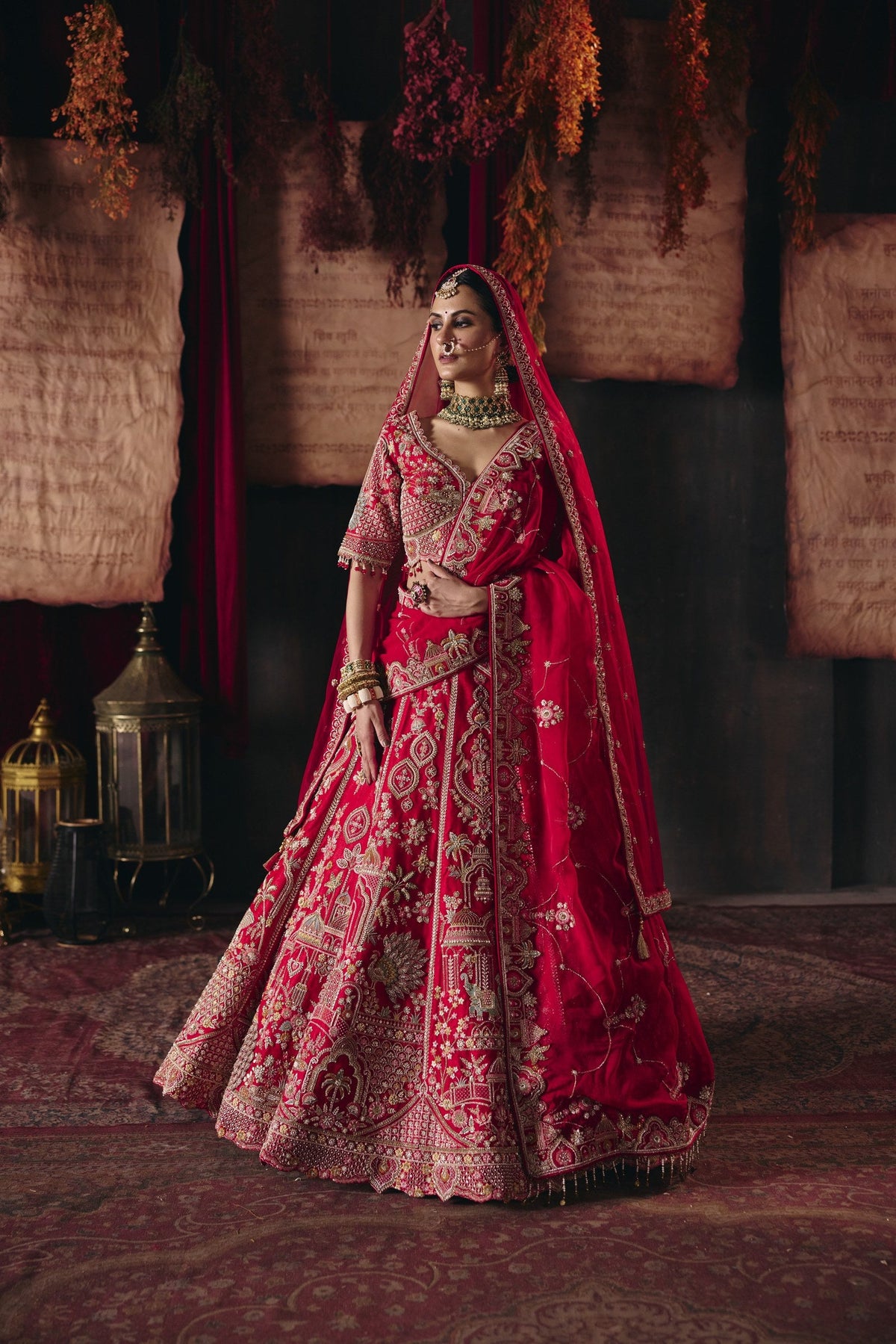Red palace and peacock motif bridal lehenga set, full length