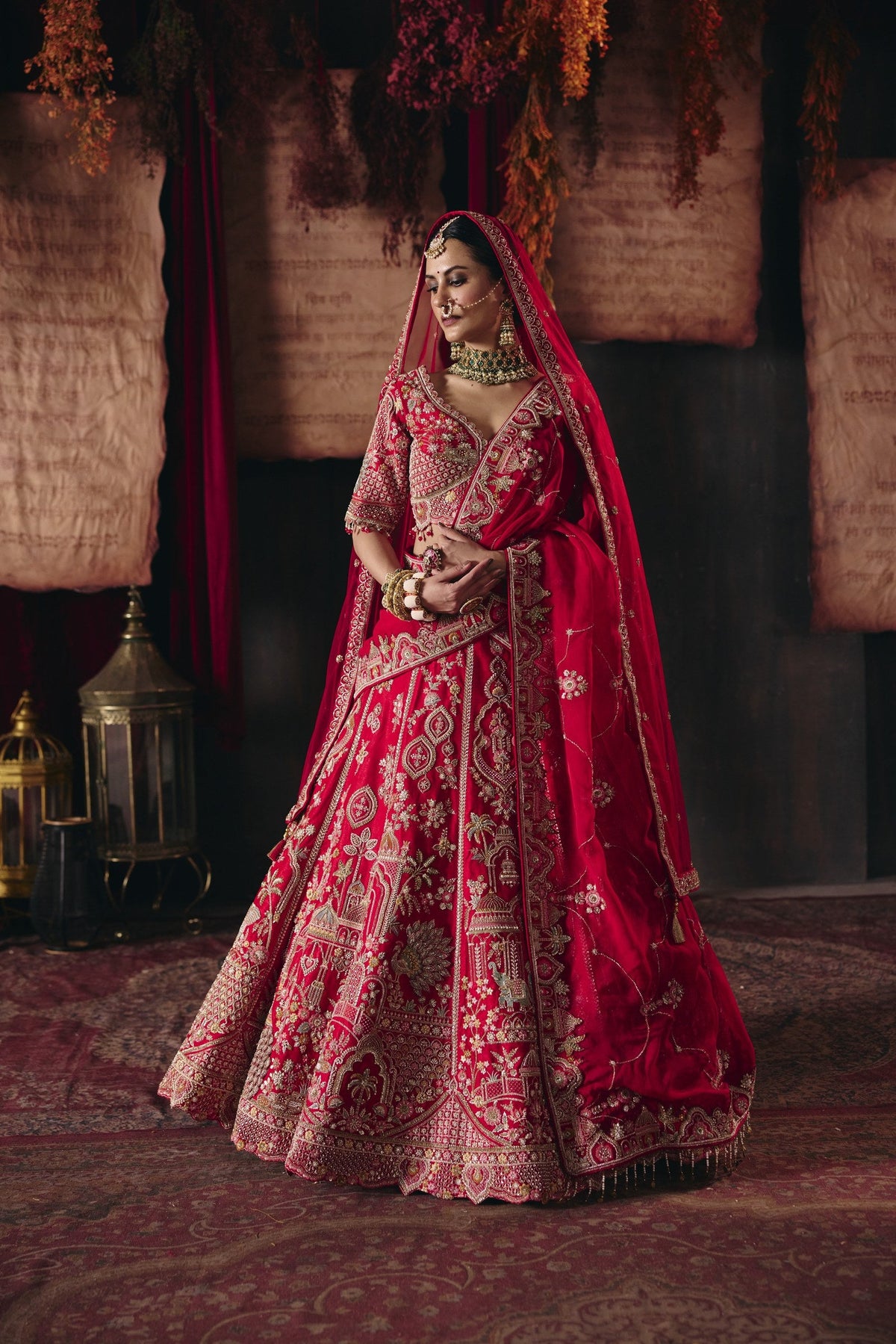 Red palace and peacock bridal lehenga, full length side view