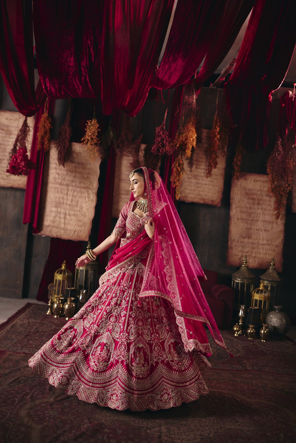 Deep pink bridal lehenga in a twirl