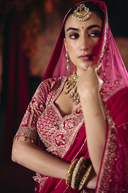 Deep pink bridal lehenga, sleeve and blouse detail