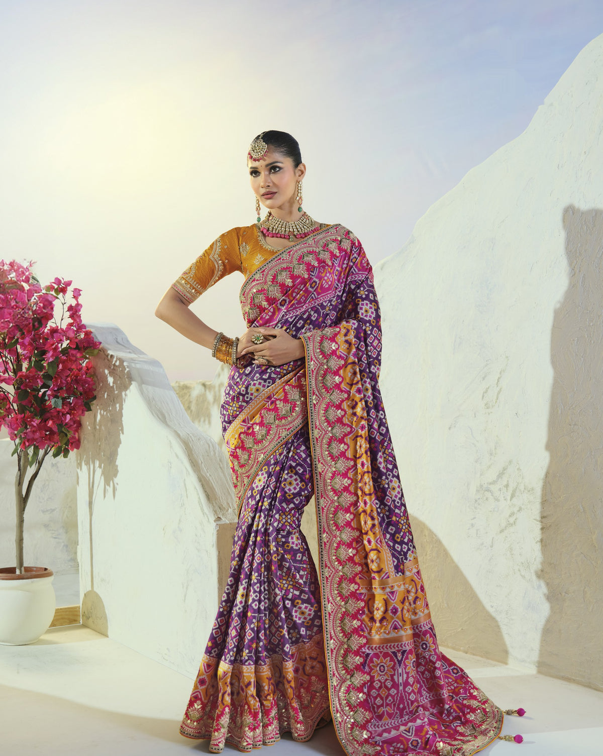 Purple and rani pink patola saree, full length