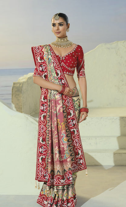 Cream patola saree, draped front view