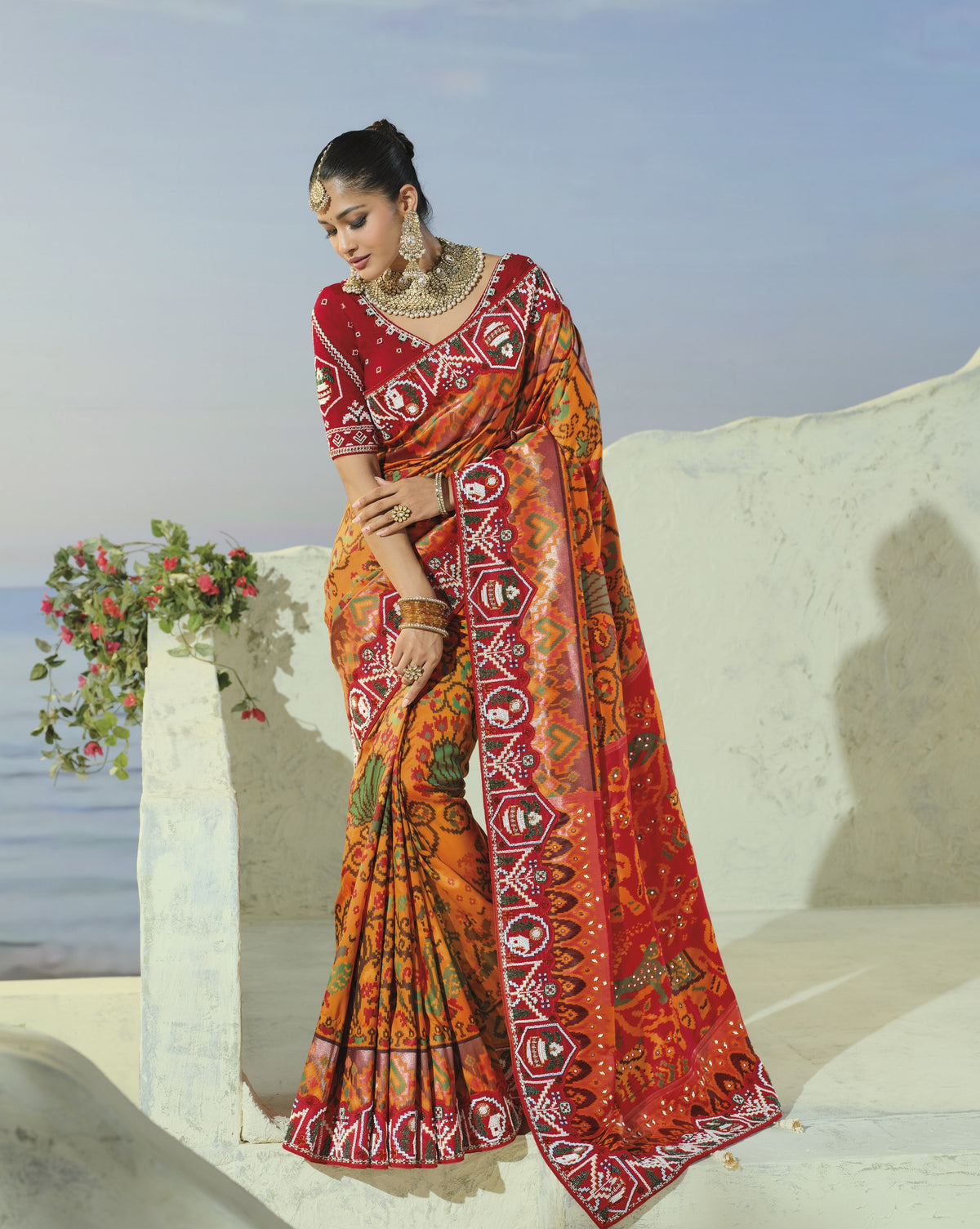 Orange and red patola saree, full length