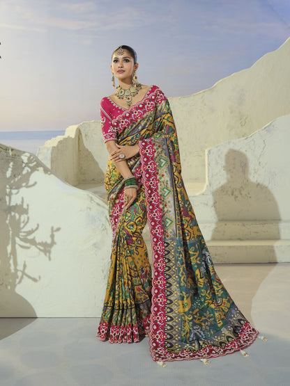 Mustard and teal patola saree with rani border, full length